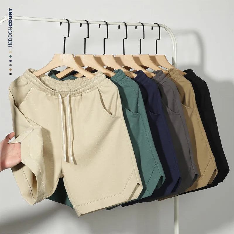 Japanese men's clothing 2025 summer new twill cotton retro wide leg sweatpants loose sports mid pants men's five quarter pants
