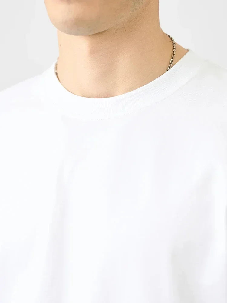 2026 Fashion Trend High-End Luxury  Small Emblem Graphic Tee, Black Cotton Crewneck for Men & Women Outdoor Streetwear
